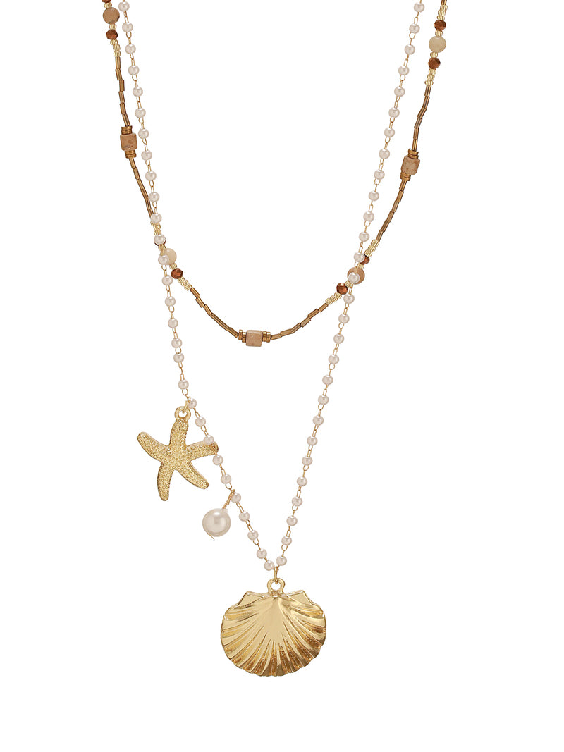 The model is flaunting Coastal Layered Necklace of Zelci