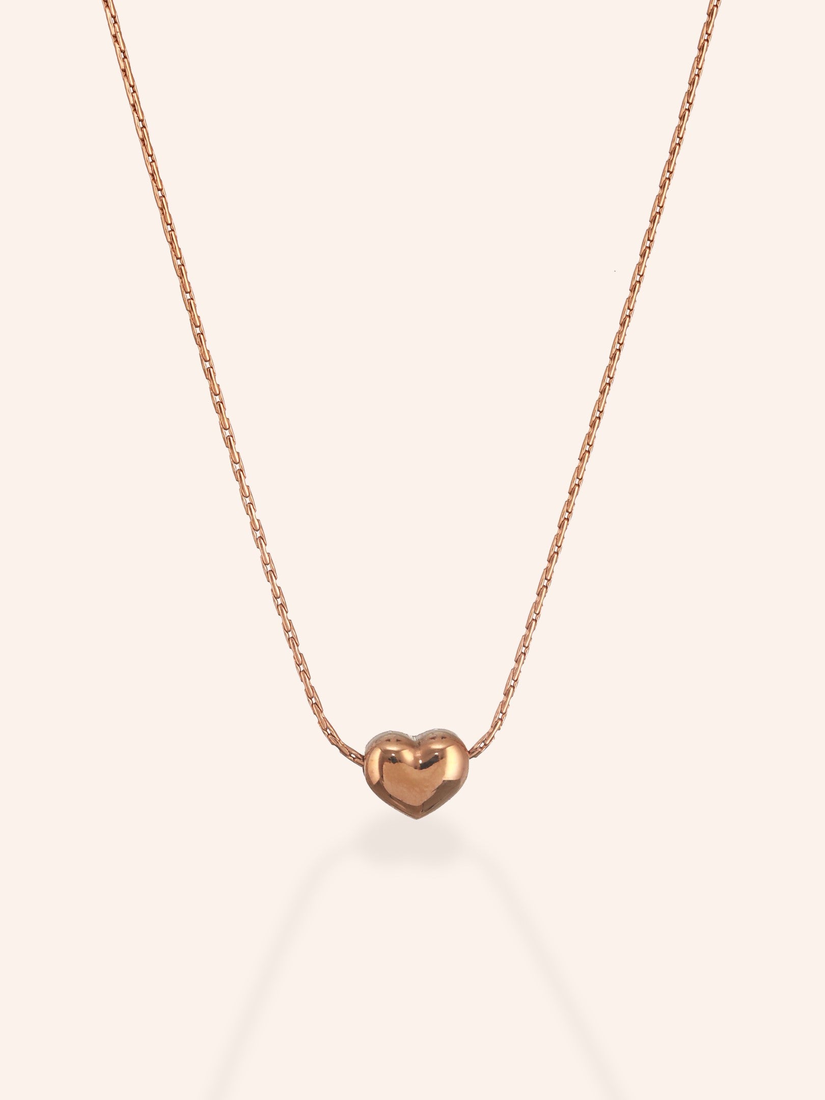 Heart-shaped pendant of Zelci’s Heartbeat Pendant-18K Gold Plated has been highlighted