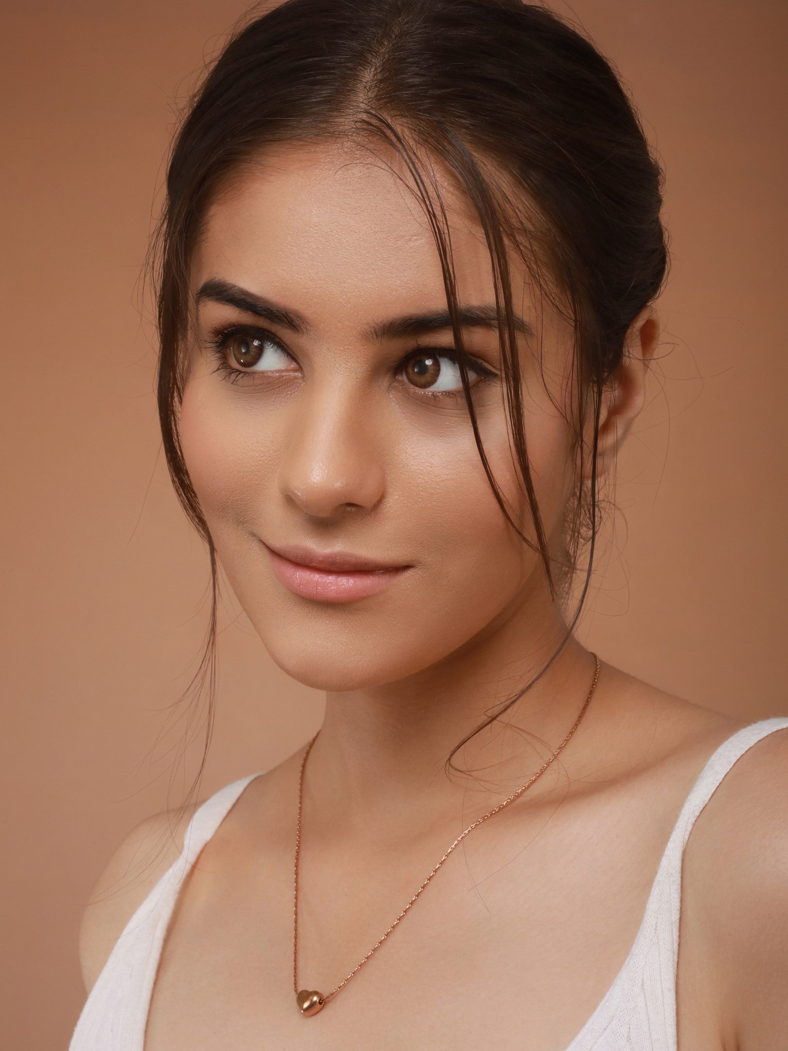 Worn with confidence, Zelci’s Heartbeat Pendant-18K Gold Plated steals the spotlight