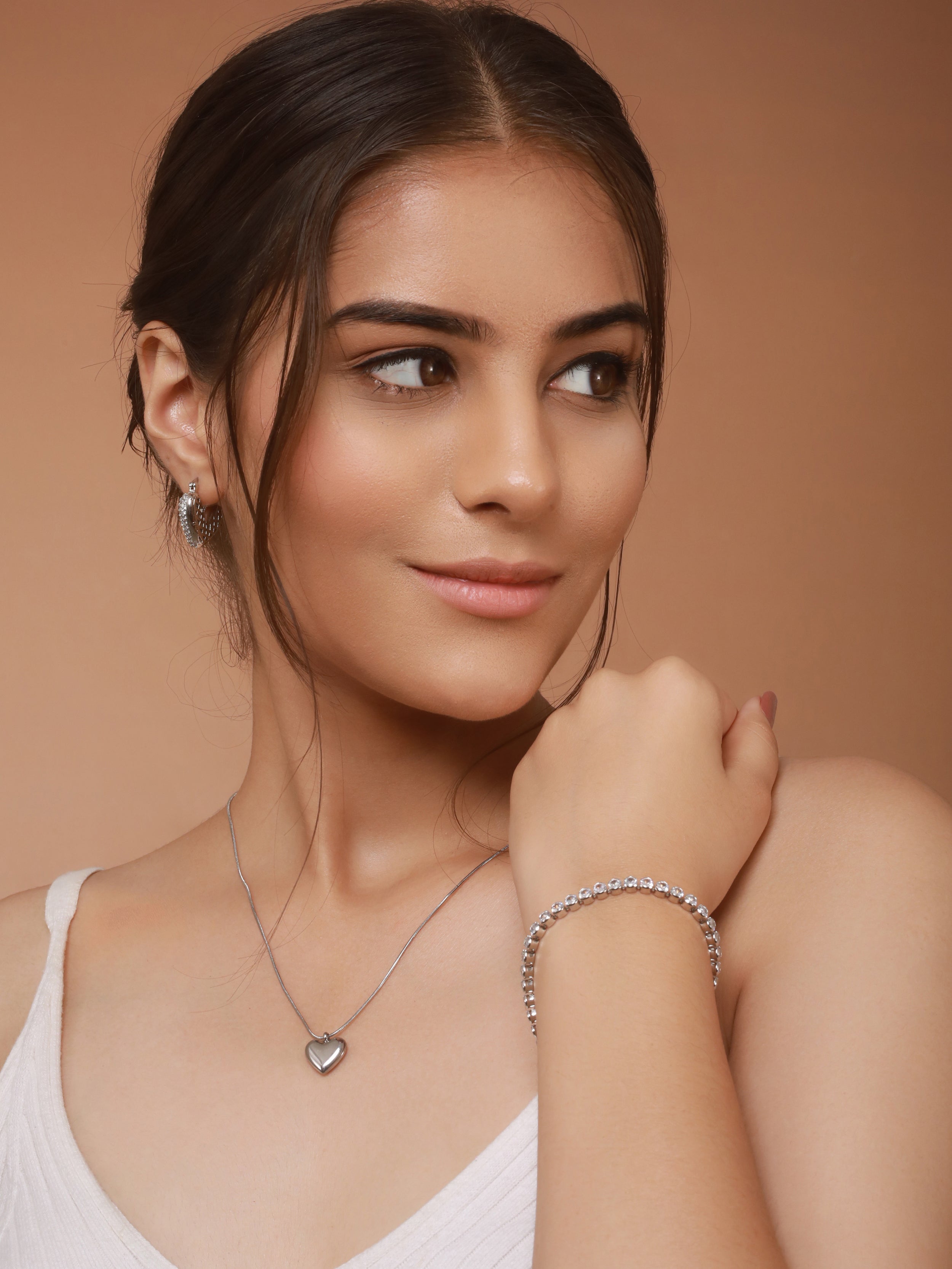 A model is featuring Akoya's jewelry
