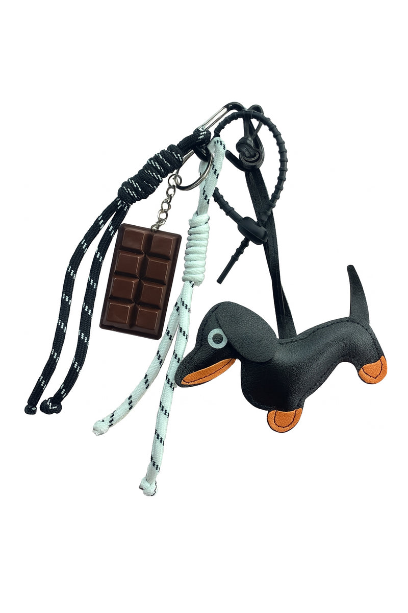 Dapper Dachshund Keychain with dachshund design and chocolate bar on a white background