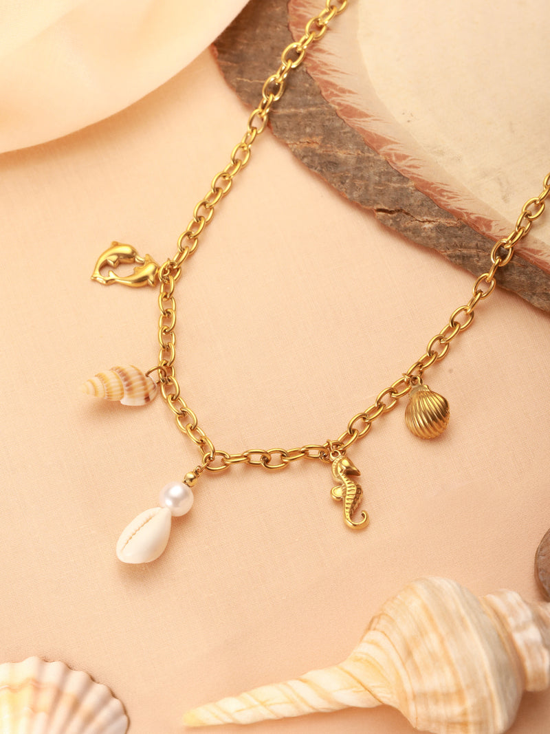 Zelci's Seabreeze Charm Chain has been presented with a matching background with shells