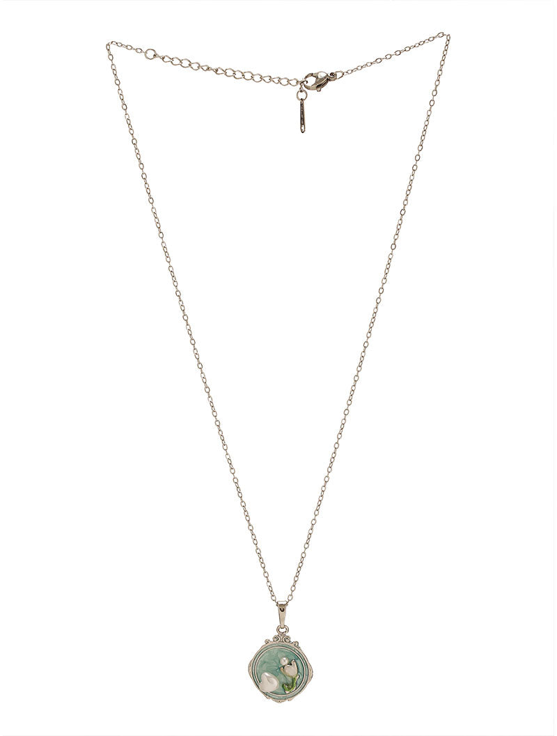 Showcasing Zelci’s Cameo Pendant in White Setting