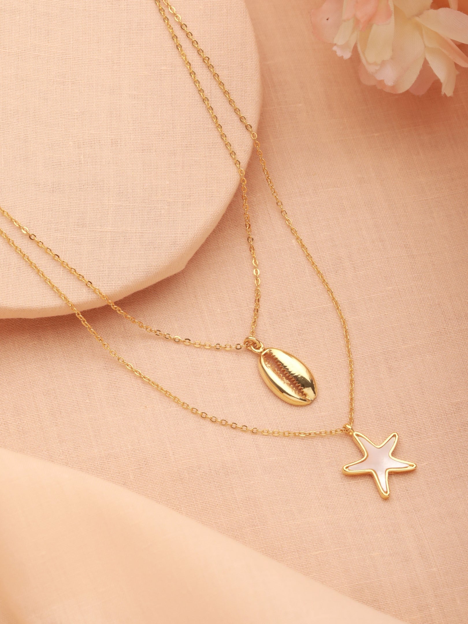 Zelci's Mermaid Layer Necklace shines in a captivating scene