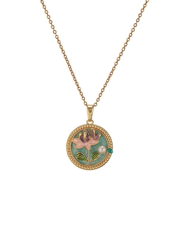 Zelci's Circular medallion with floral enamel design has been highlighted