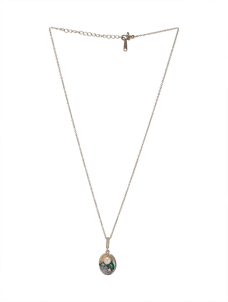 Pearl Garden Pendant of Zelci is showcased on a white backdrop