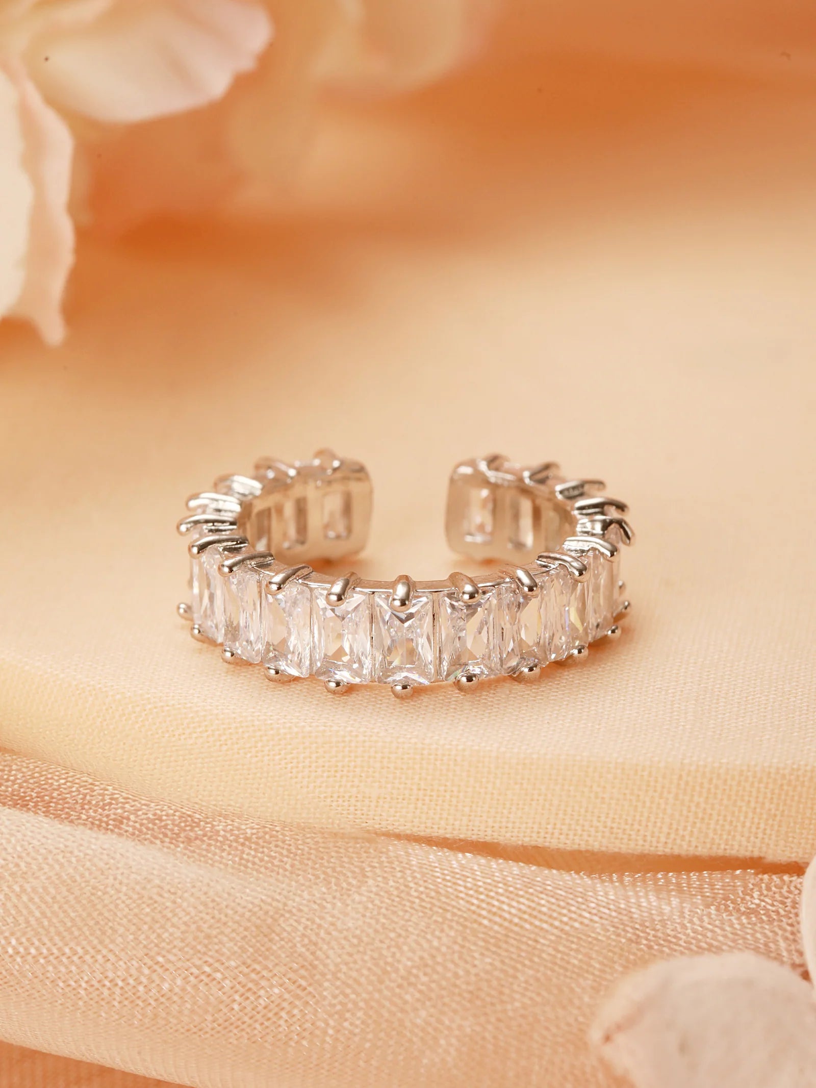 The intricate surface design makes Zelci’s Eternal Shine Ring Duo look striking