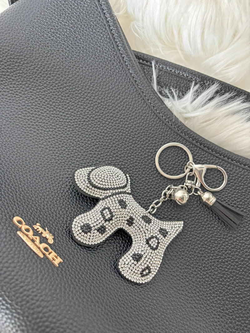 Zelci's Glam Dalmatian Keychain has been displayed on Coach bag 