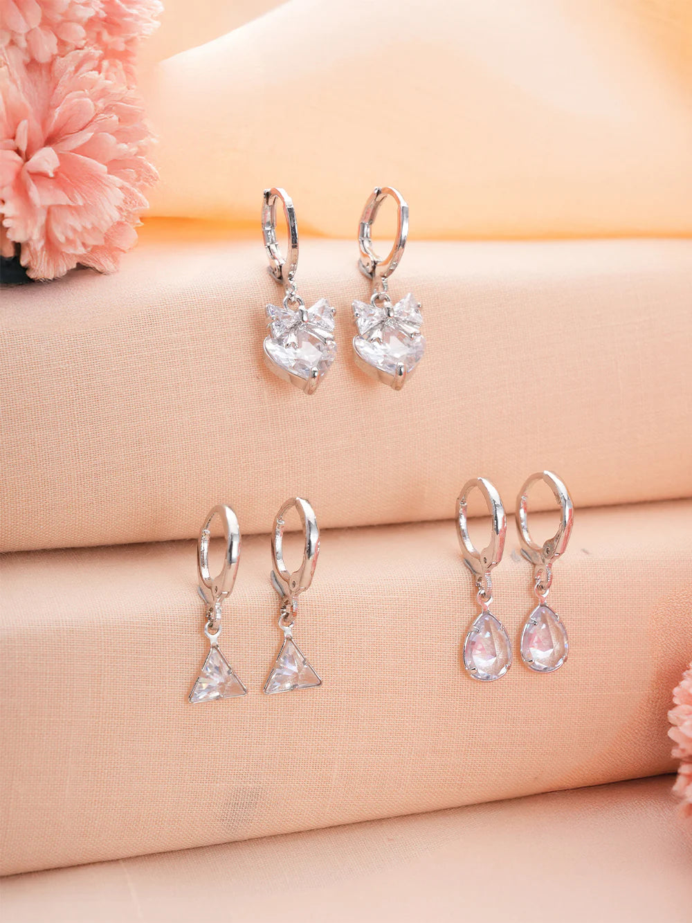 Zelci’s Bowtiful Trio set has been presented on a decorative background 