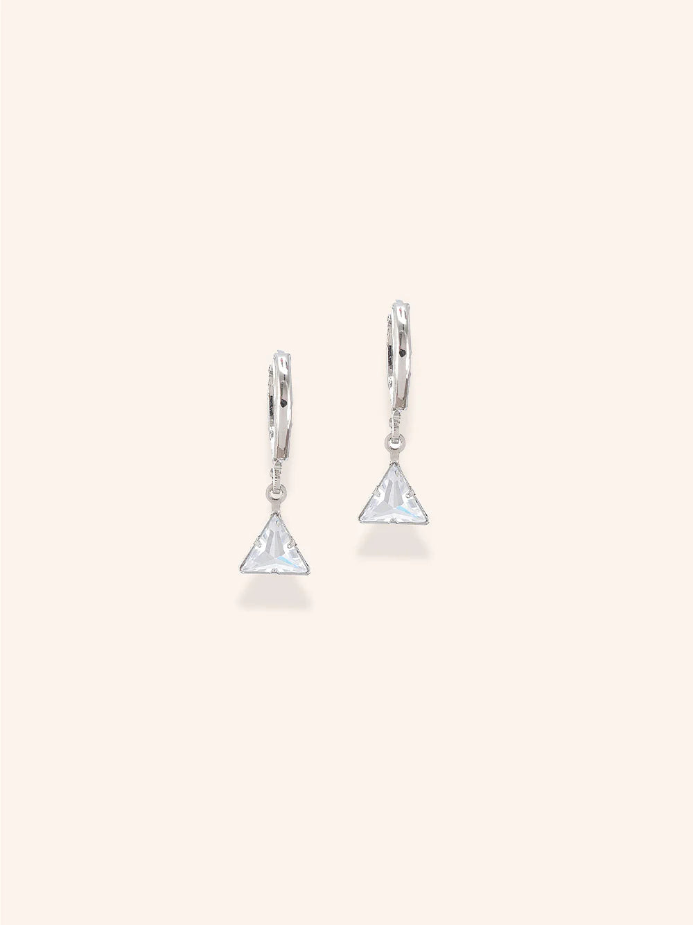 Chic Trinity Twinkle Earrings of Zelci’s Bowtiful Trio set are highlighted on a white backdrop