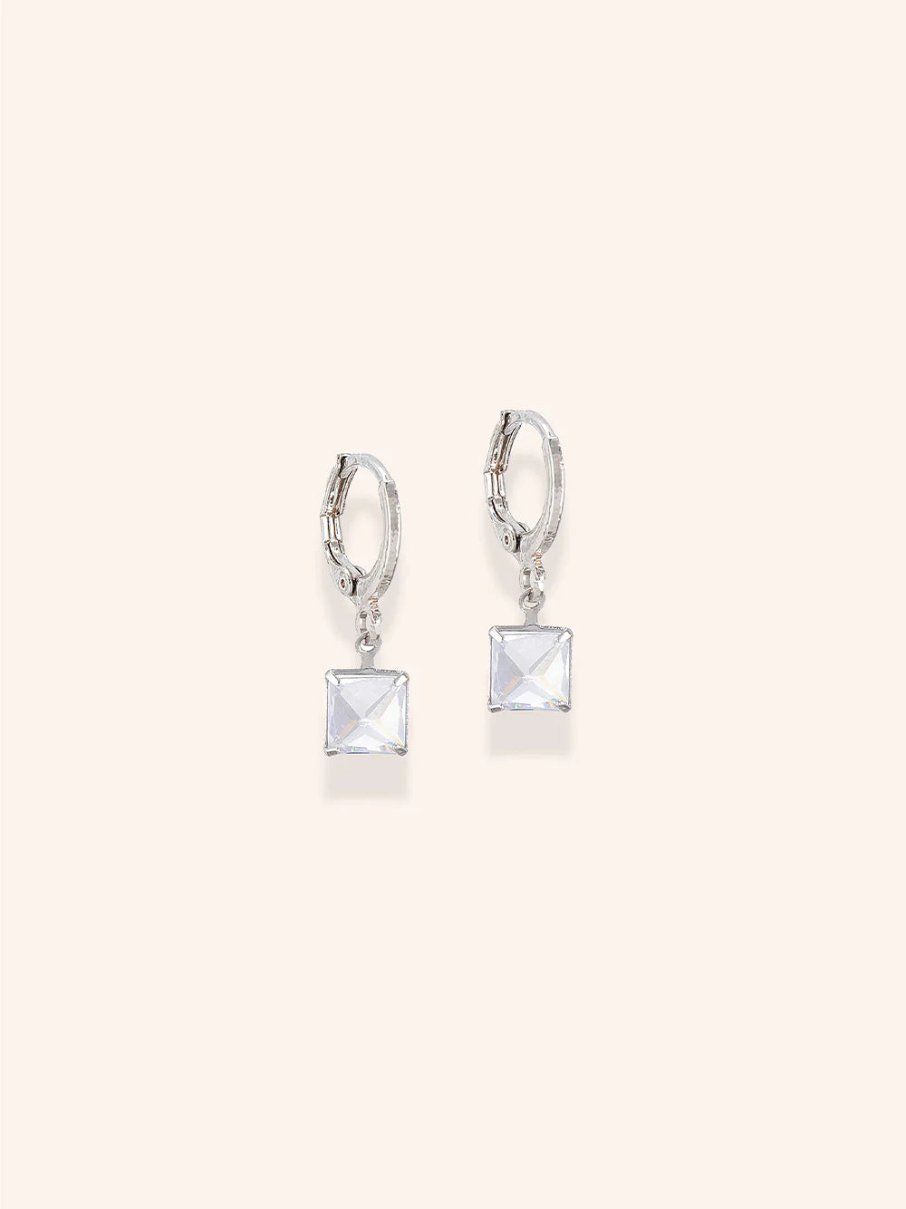 Presented with a minimal white background,  square-shaped Sparkling Crystals of Zelci 's Floral Sparkle Trio exude luxury