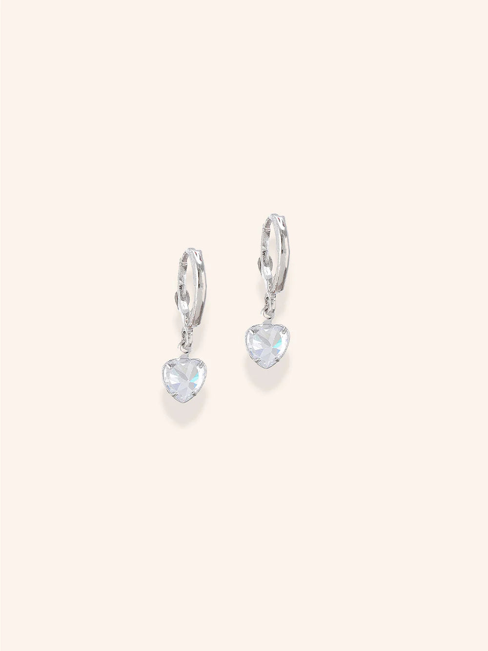 Presented with a minimal white background, The Floral Sparkle Trio of Zelci exude luxury
