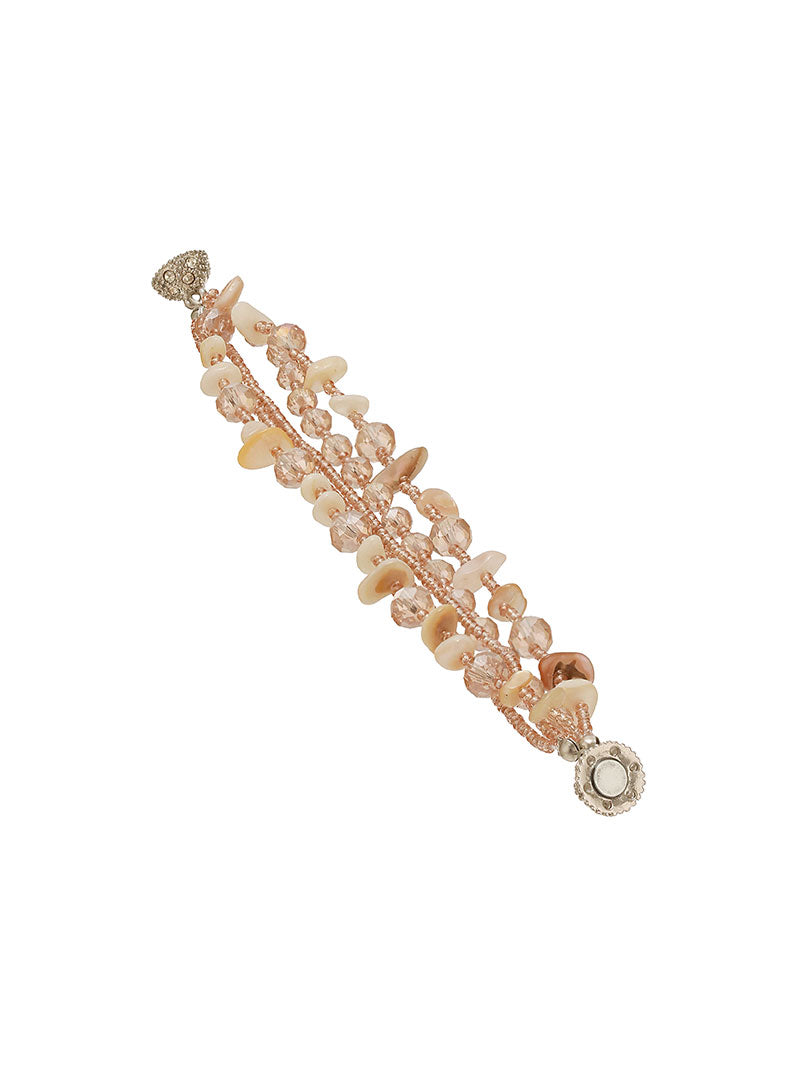 Zelci’s Dusk Bead Bracelet lies gracefully in a diagonal display on white