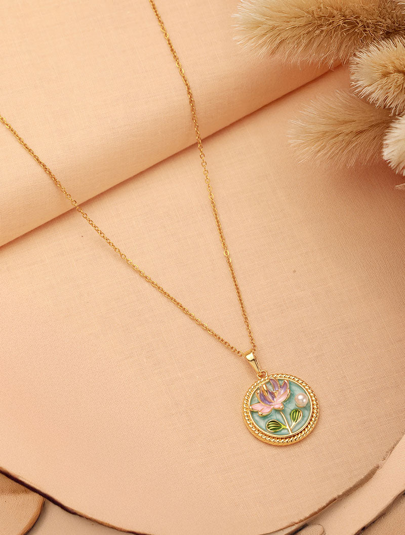 A decorative setting frames the radiant elegance of Zelci’s Cameo Pendant